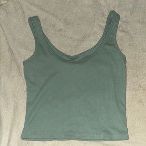 Sage green tank top great quality never been worn but the tags are off.